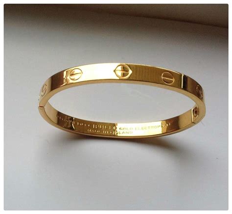 charles revson 1970 aldo cipullo love bracelet gold electroplate|aldo cipullo love bracelet.